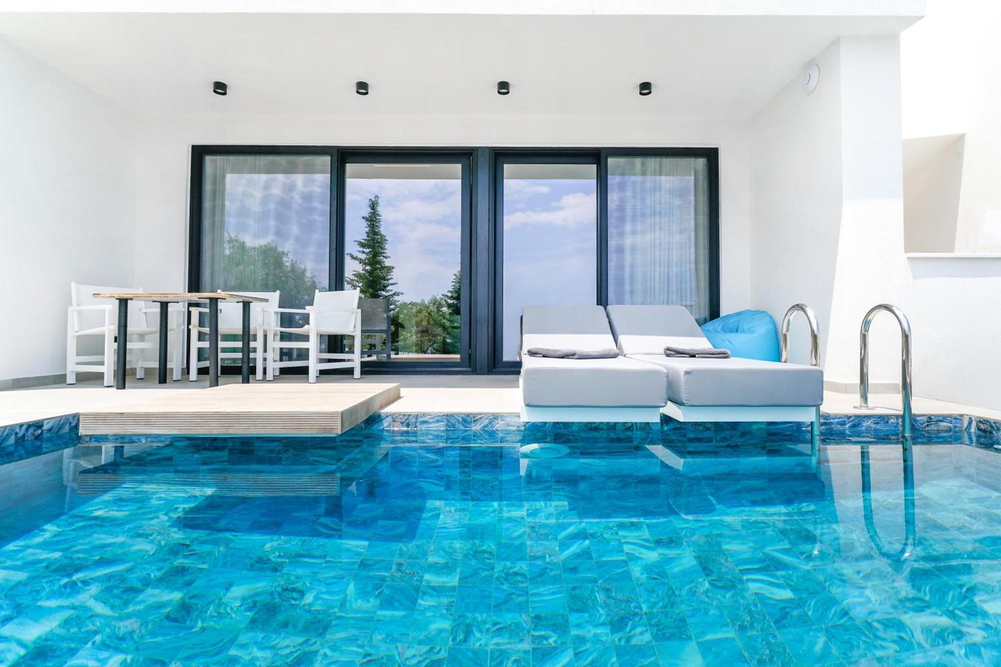 Mythodea Prive Luxury Suites Chrisi Ammoudia Eksteriør billede